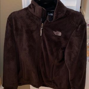 Brown fuzzy north face jacket